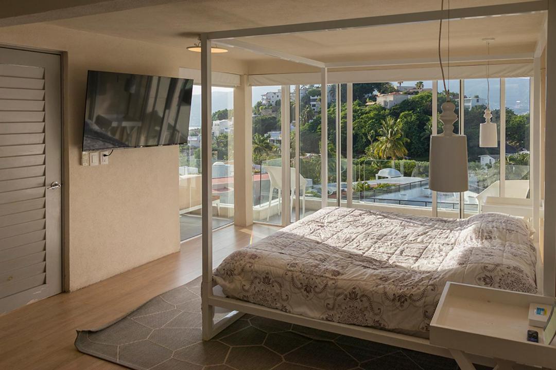 Casa Con Vista A La Bahia Case de vacanță